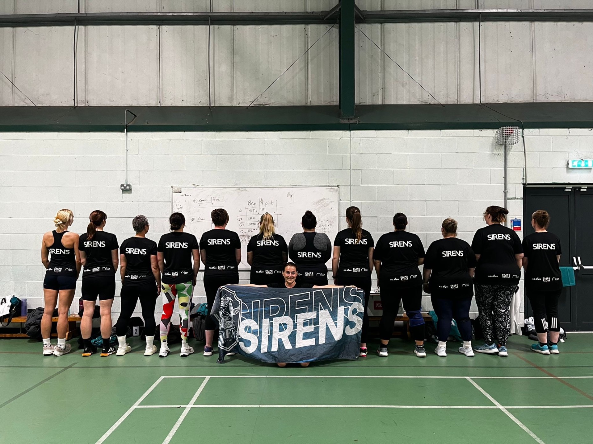 The Sirens Netball squad lined up on court
